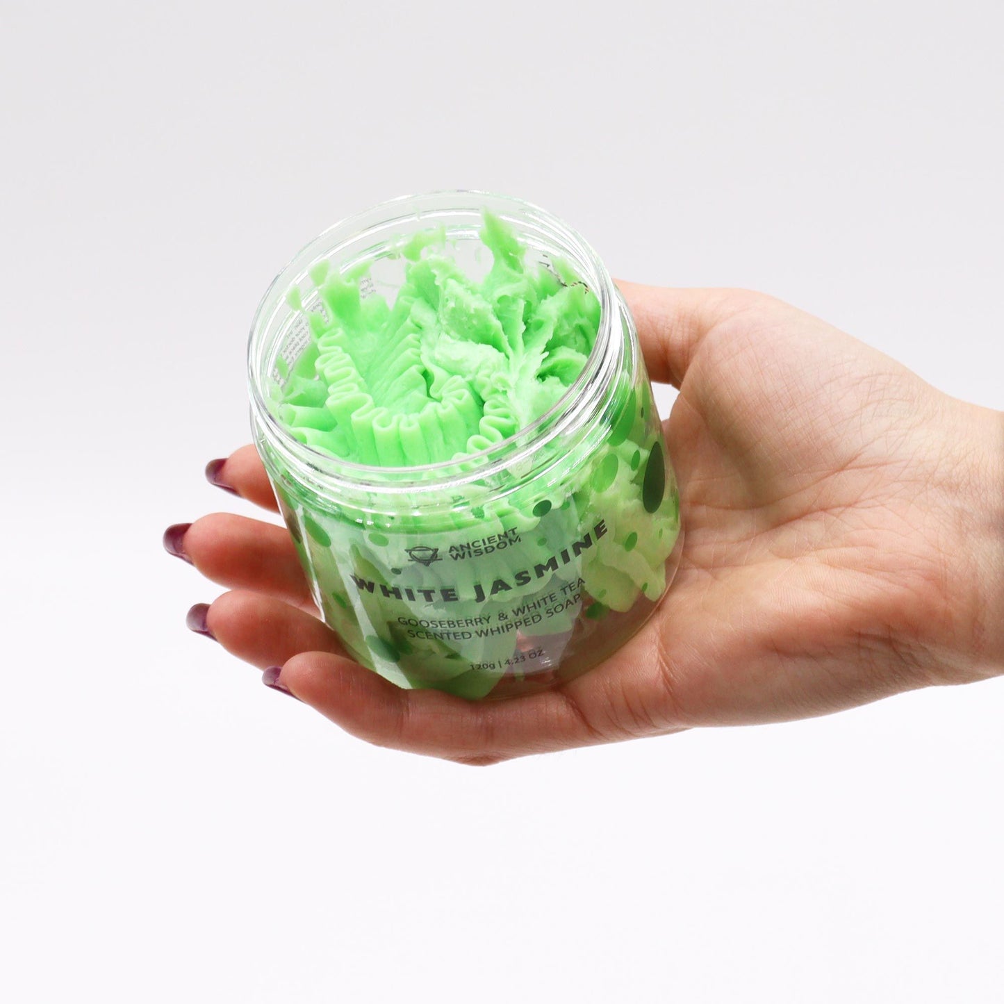 Gooseberry and White Tea whipped soap with fresh fruity fragrance and creamy texture in a clear jar