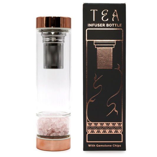 Glass tea infuser bottle with rose gold accents and rose quartz crystal chamber.
