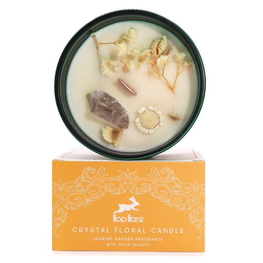 Soy wax candle with smoky quartz, dried flowers, wooden wick in dark green jars.