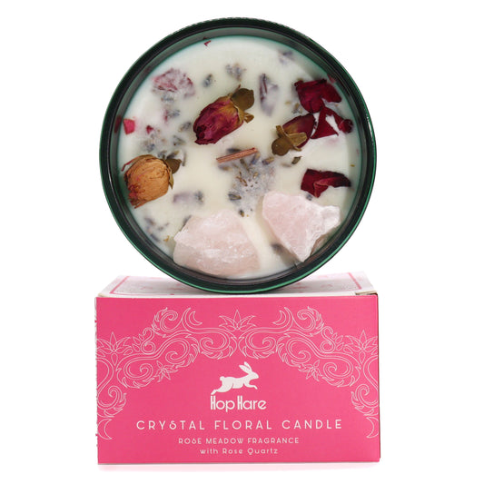 Soy wax candle with Rose Quartz crystals, dried rose petals, wooden wick in dark green jar.
