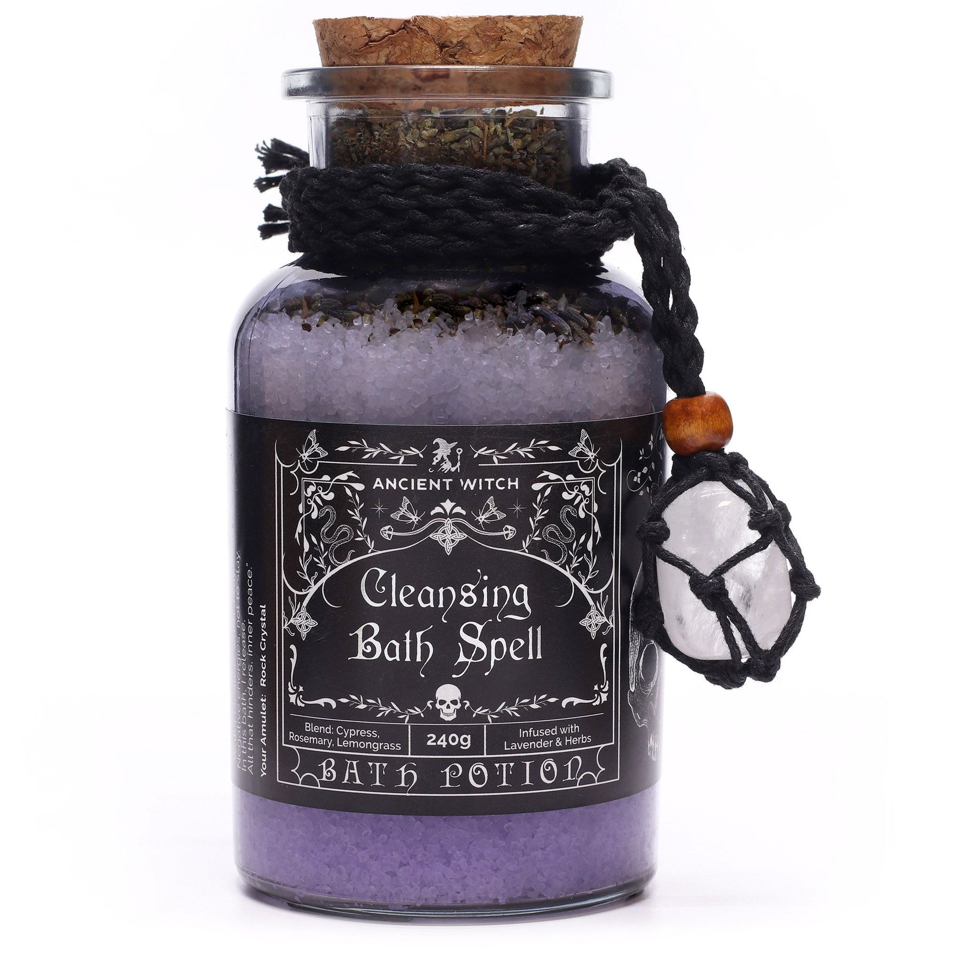 Glass bottle with cork lid filled with Himalayan bath salts, lavender and botanicals infused with Cypress, Rosemary and Lemongrass essential oils with a Clear Quartz crystal amulet