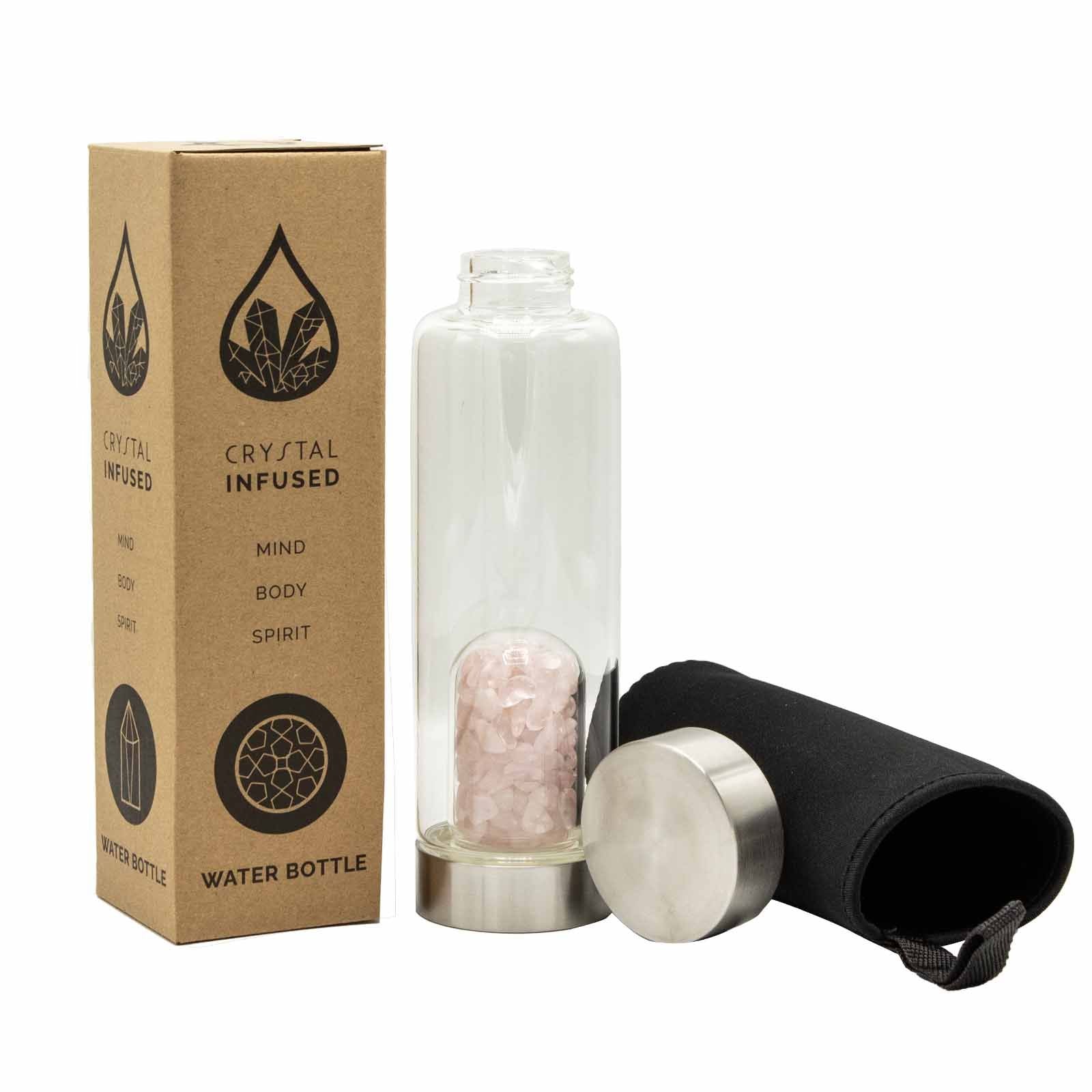 Glass water bottle with stainless steel base and lid, containing rose quartz chip dome