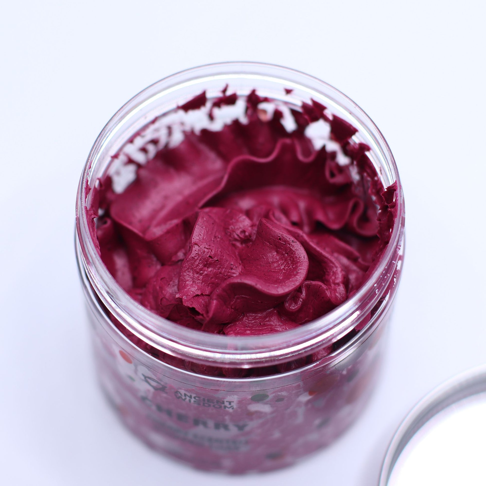 Cherry whipped soap with sweet juicy cherry fragrance and creamy texture in a clear jar