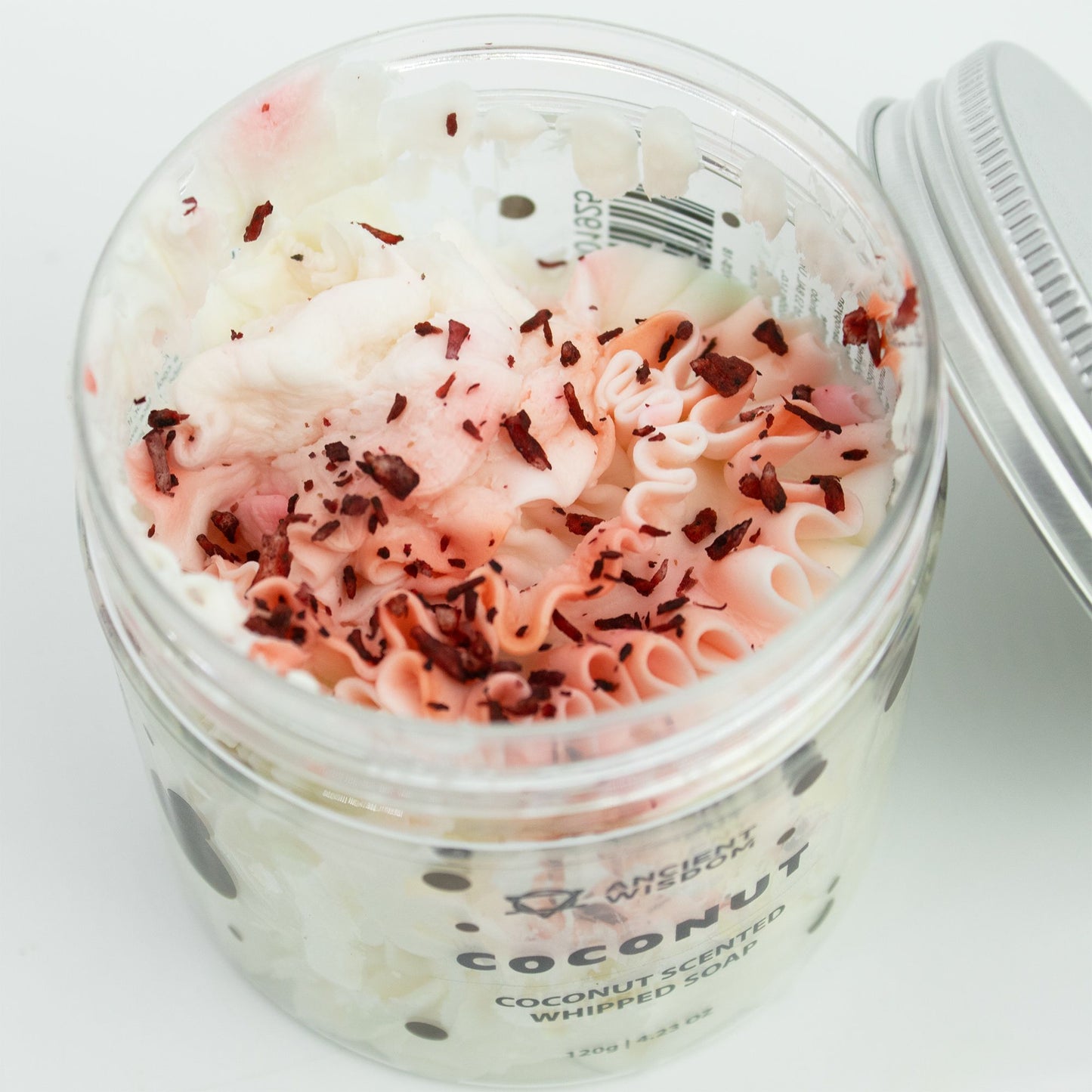 Coconut whipped soap with creamy tropical coconut fragrance and soft whipped texture in a clear jar